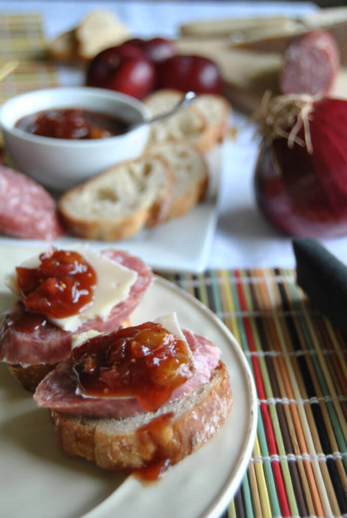 Asian Plum Onion Chutney on bread with cheese and sausage